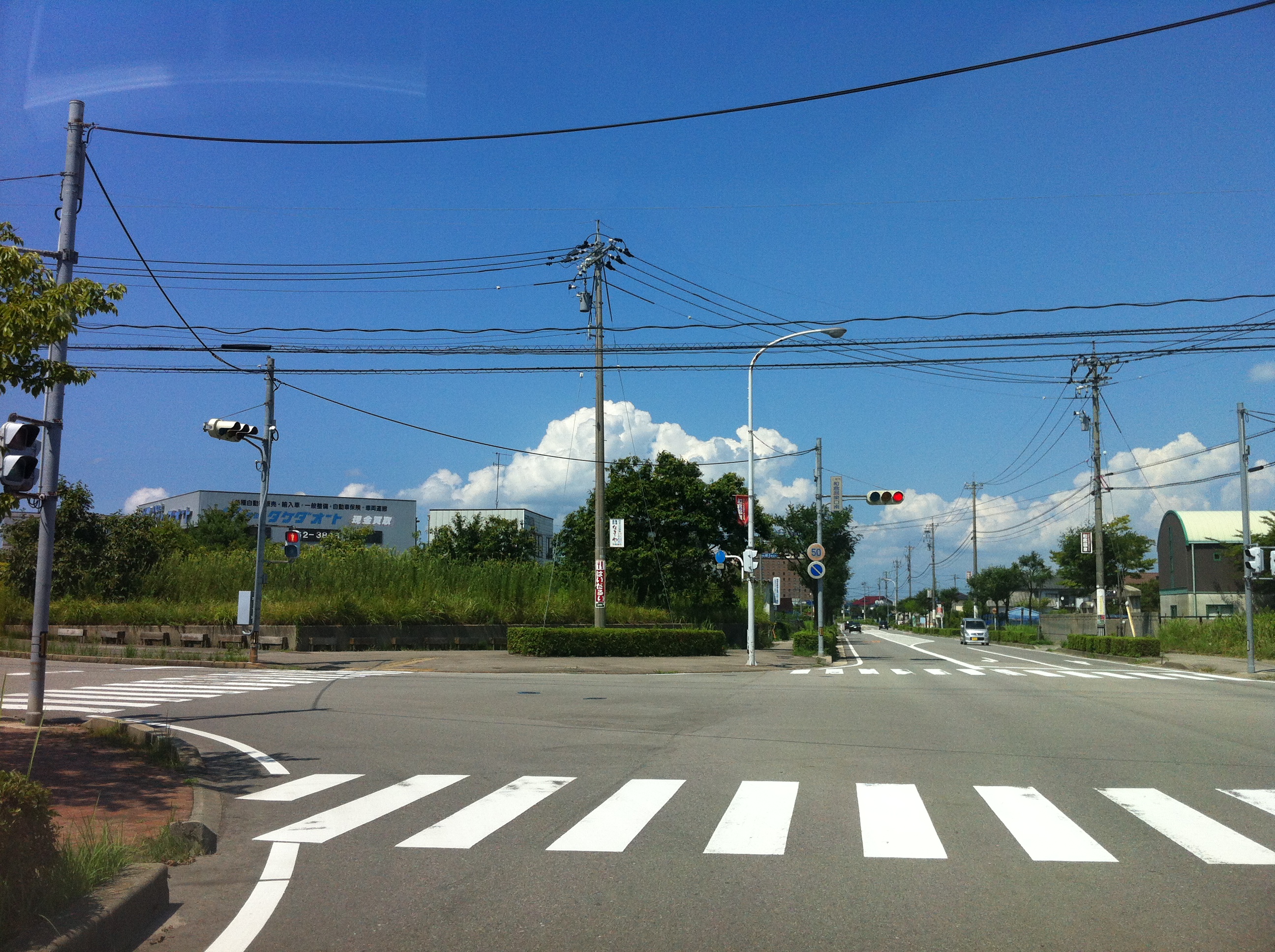 和倉温泉の温泉街と七尾湾の風景